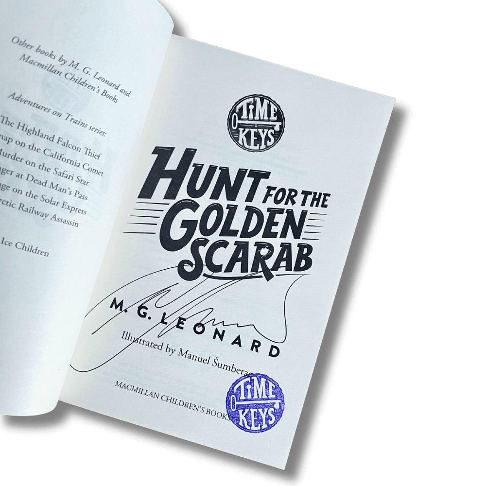 Signed and stamped copy of Hunt for the Golden Scarab by M. G. Leonard